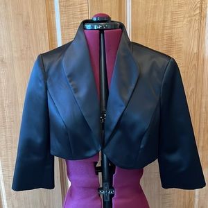 White House/ Black Market satin shrug. Black size M.